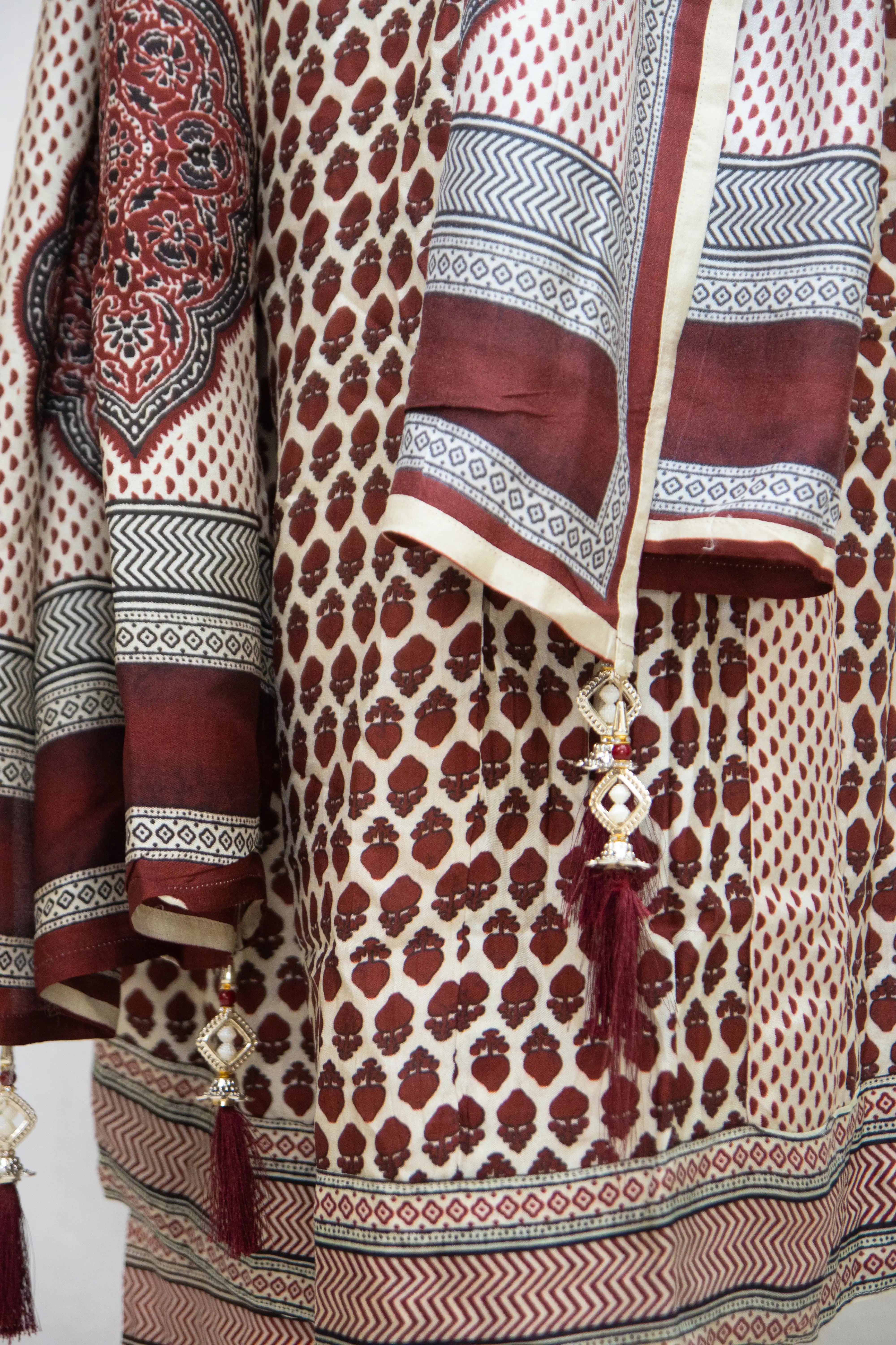 RutuBeigeandMaroonkurtaset