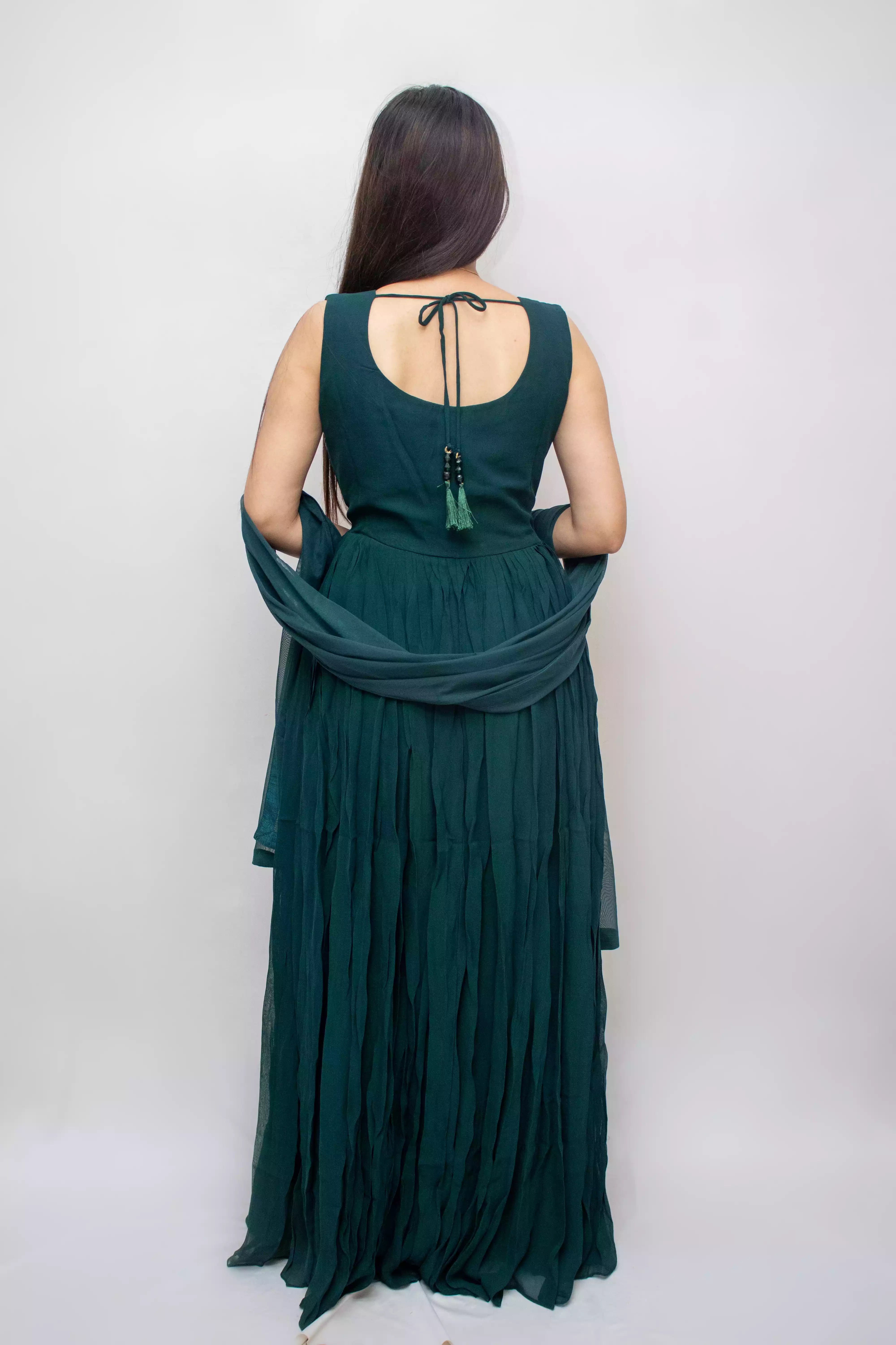 Emerald Grace: Bottle Green Chiffon Gown with Hand Work