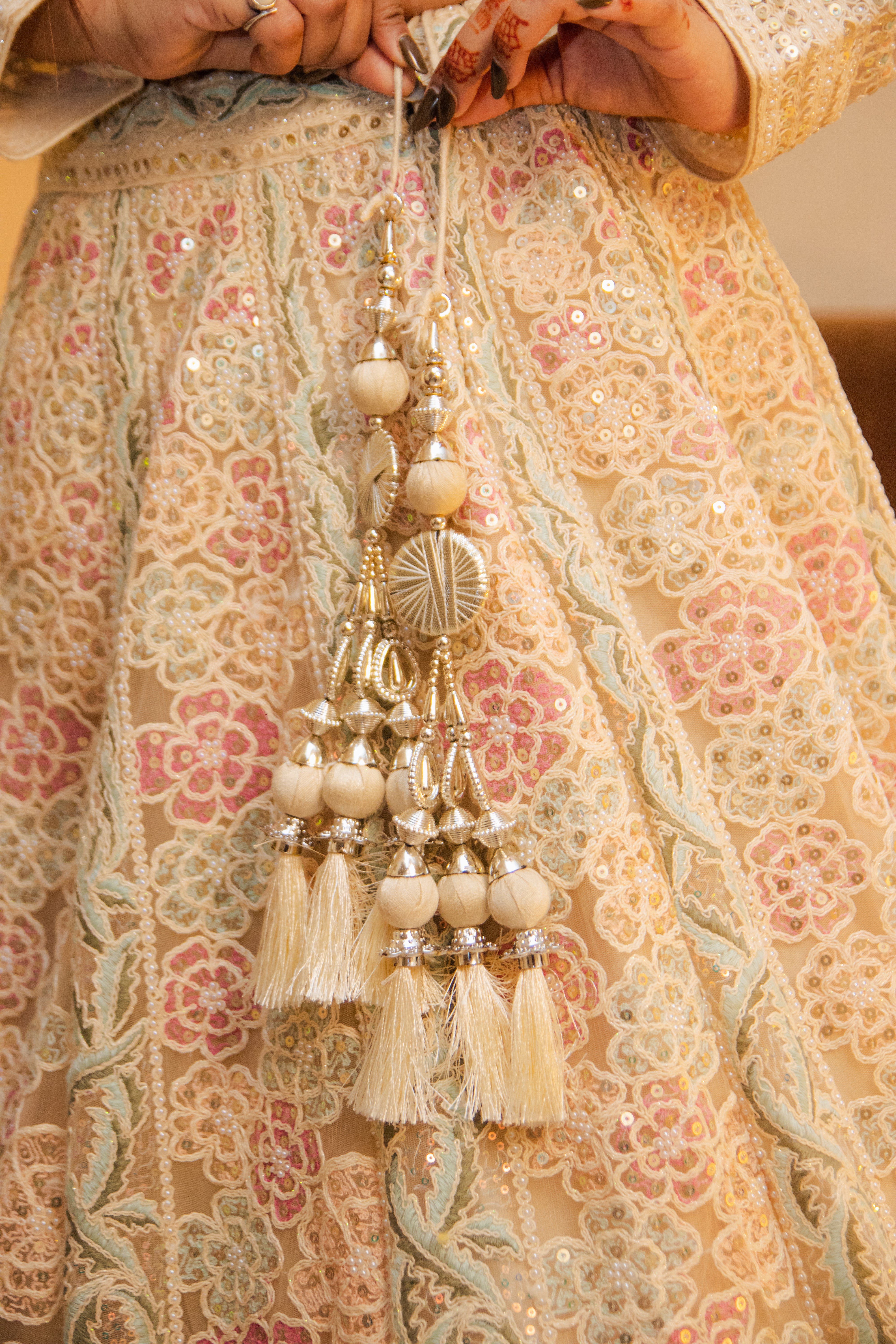 Cream hand embroidered ghagra with intricate detailing